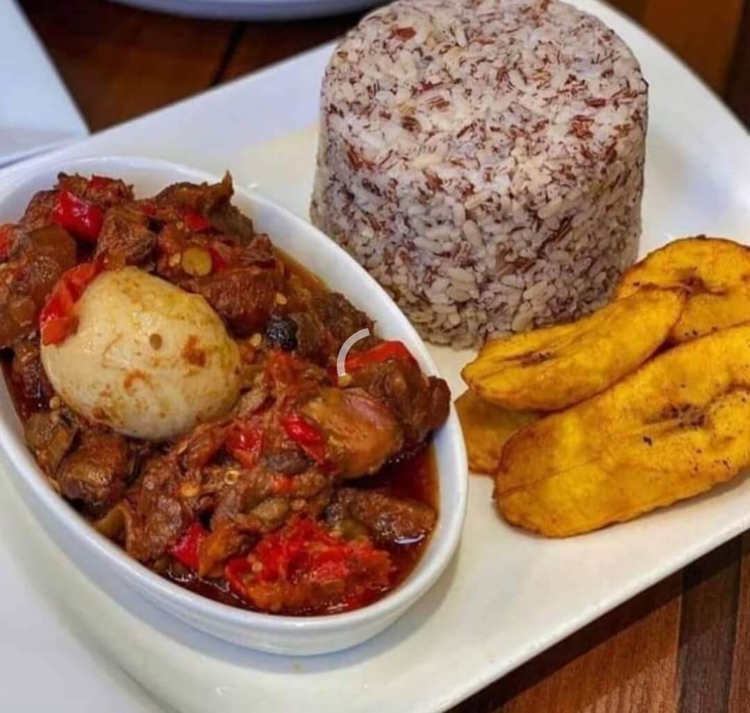 Cooked Ofada rice with stew